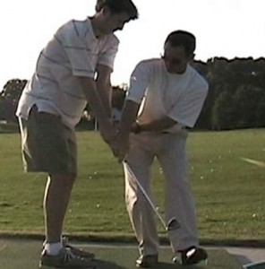 Demonstration of takeaway in backswing - golf swing lesson by Herman Williams. 